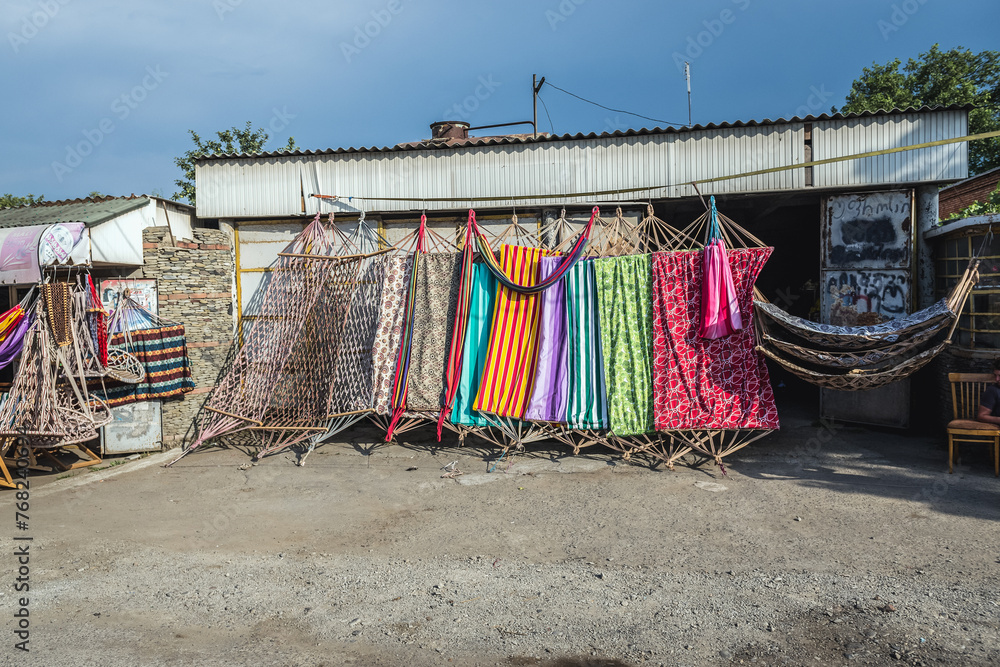 Hammocks and deckchairs for sale in roaside shop, Georgia