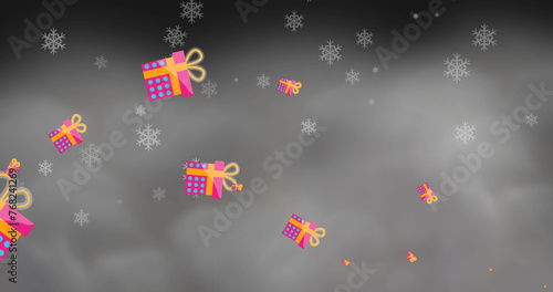 Image of christmas presents and snow falling