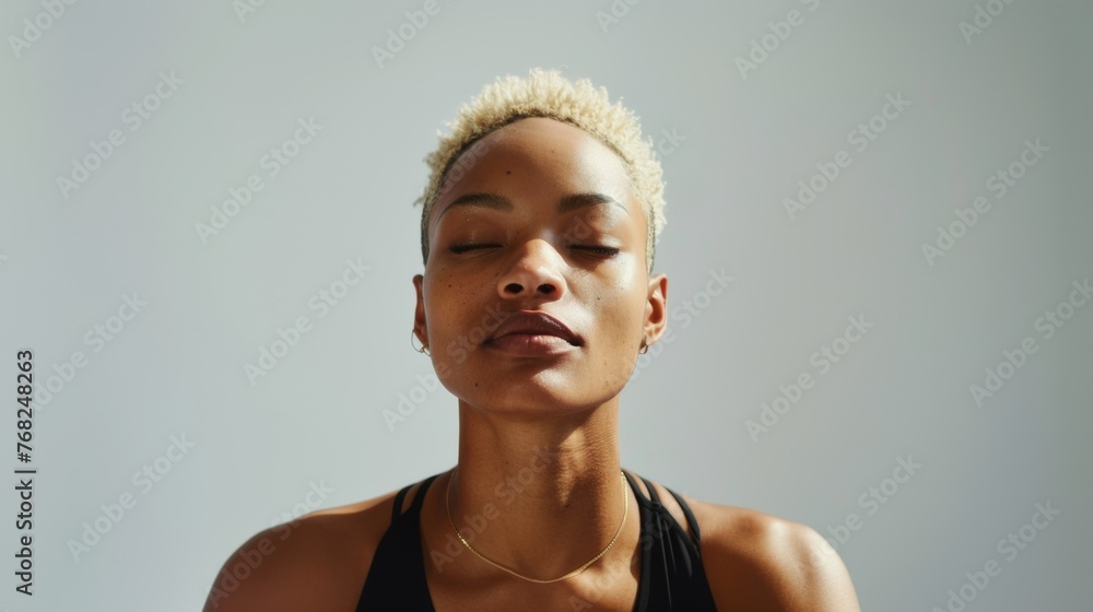 Attractive woman with a fashionable hairstyle in stylish sportswear. Fashion and beauty, active lifestyle and sports. Attractive woman with a fashionable hairstyle in stylish sportswear. Fashion and beauty, active lifestyle and sports.