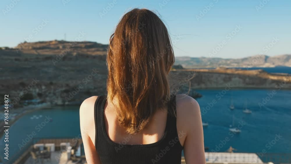 Girl on the balcony. Travel and vacation concept. Girl on the balcony. Travel and vacation concept.