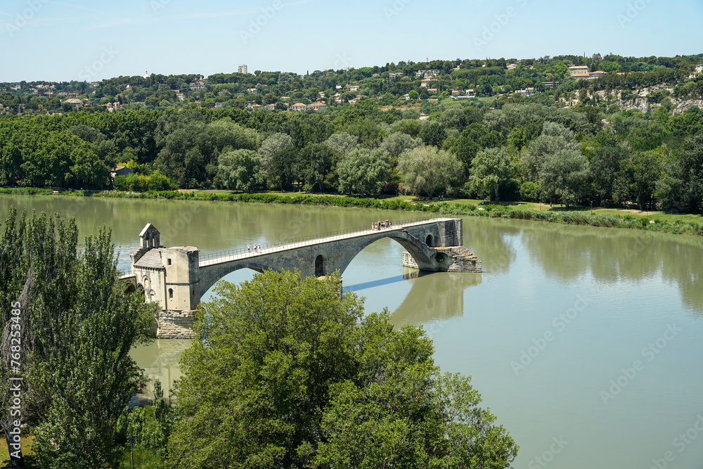 Pont d'Avignon medieval bridge across Rhone river (Pont Saint Bezenett) aerial view, popular tourist landmark, Provence, France