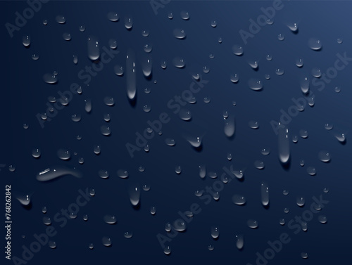Condensation water falls on glass background. Rain drops with light reflection on dark window surface, abstract wet texture, scattered pure aqua spots pattern.