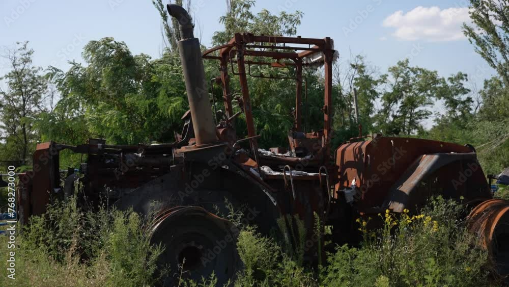 Rustic Tractor in Disrepair. Rusted tractor overtaken by vegetation, relic of agricultural life. Concept War Destruction Rustic Tractor in Disrepair. Rusted tractor overtaken by vegetation, relic of agricultural life. Concept War Destruction