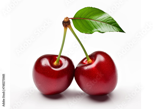 Two juicy ripe cherries with a leaf, isolated on a transparent background.