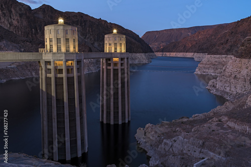 Hoover Dam intake towers and Lake Meade reservoir shown at dusk. Recent image taken in mid-March, 2024.