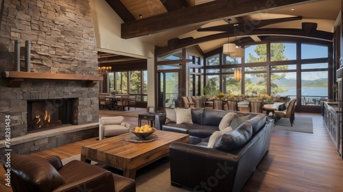 Warmly rustic yet modern ranch-style great room with vaulted wood plank ceilings and massive stone fireplace