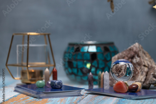 Fortune Telling Table with a crystal ball and tarot cards.