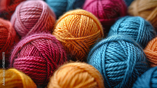 This striking image features a variety of brightly colored yarn skeins, with an emphasis on the texture and hues