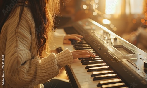 A cute girl playing a melod...