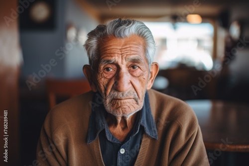 Portrait of a senior hispanic man in nursing home