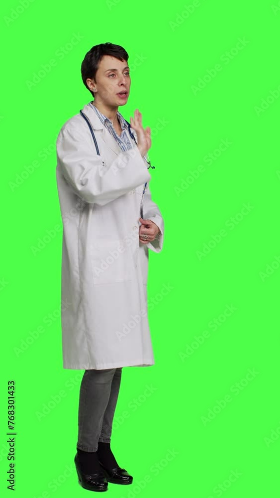 Side view Woman health specialist showing no sign and being furious against greenscreen backdrop, expressing negativity and rage in studio. Angry physician screaming and shouting at people. Camera A. Side view Woman health specialist showing no sign and being furious against greenscreen backdrop, expressing negativity and rage in studio. Angry physician screaming and shouting at people. Camera A.