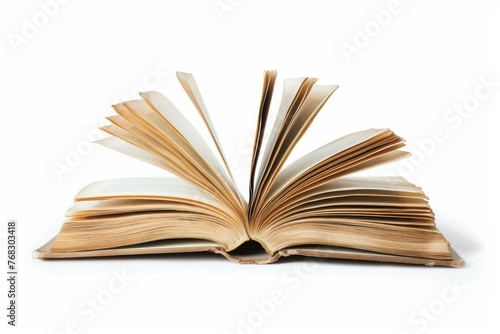 Image shows an open book with pages gracefully standing outward against crisp white background