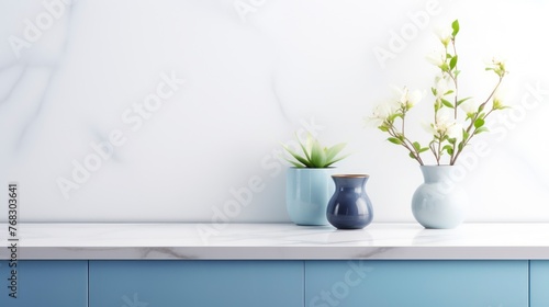 White marble countertop with indoor plant and vase