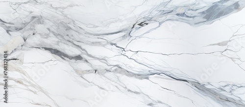 A closeup of grey marble texture resembling snow covering a slope. The intricate lines and patterns could be mistaken for a piece of art or a detailed drawing