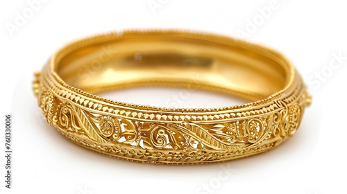 An elegant Indian design gold bangle, showcased in isolation against a white background