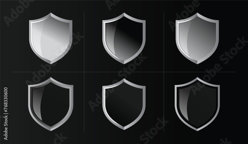 Shield Shape with Golden and Silver Gradient. Sheild security and guarantee safe and elegeant symbol vector design element and shapes	
