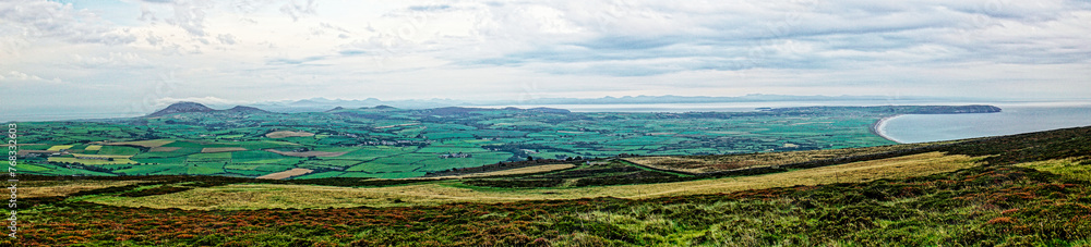 From prehistoric cairns on Mynydd Rhiw, Aberdaron, N. Wales. Panoramic L-R from N.E. Carn Fadryn and Snowdonia to S.E. Cardigan Bay and Porth Neigwl
