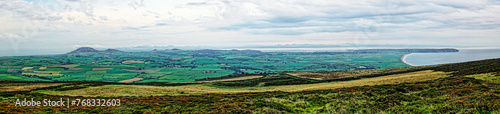 From prehistoric cairns on Mynydd Rhiw, Aberdaron, N. Wales. Panoramic L-R from N.E. Carn Fadryn and Snowdonia to S.E. Cardigan Bay and Porth Neigwl