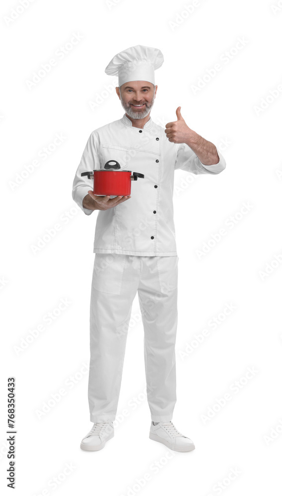 Happy chef in uniform with cooking pot showing thumbs up on white background Happy chef in uniform with cooking pot showing thumbs up on white background