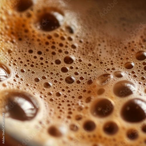 Macro shot of the surface of a cup of coffee, capturing the bubbles and the creamy texture no dust