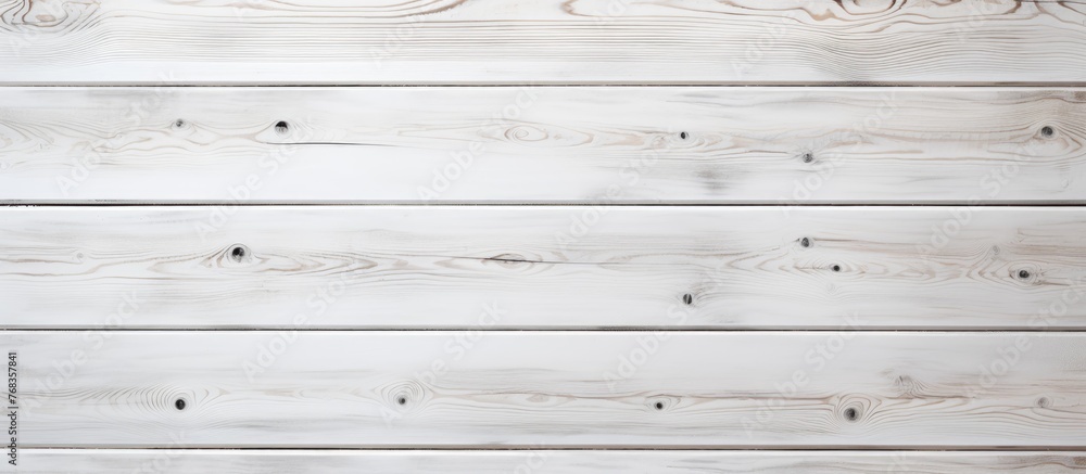 Obraz premium A closeup shot of a rectangle white hardwood table with parallel planks and wood stain pattern. The blurry background emphasizes the beauty of the wood