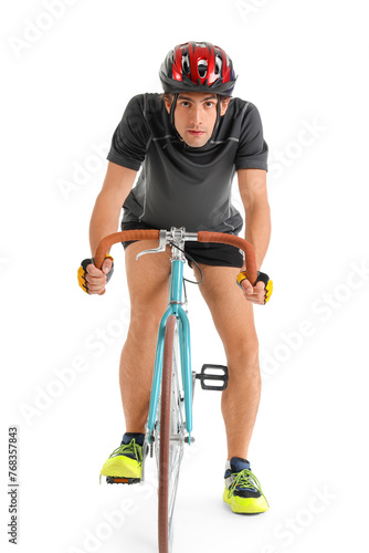 Young male cyclist riding b...