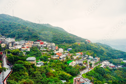 Fototapeta Naklejka Na Ścianę i Meble -  Jiufen, New Taipei, Taiwan, Republic of China, 01 22 2024: The landscape of Jiufen old street and pacific ocean	
