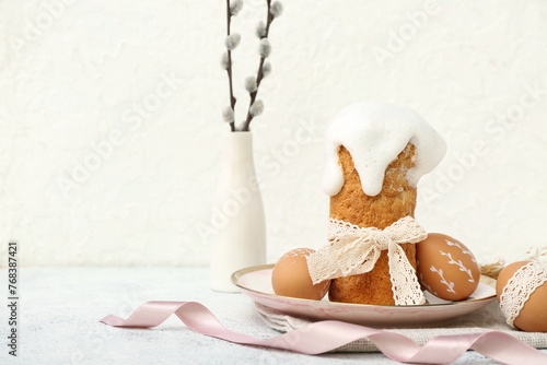 Plate with Easter cake, egg...