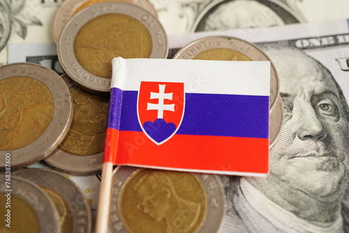 Slovakia flag on coins background, finance and accounting, banking concept. photo