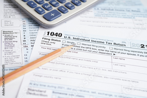 Tax form 1040 U.S. Individual Income Tax Return, business finance concept. photo