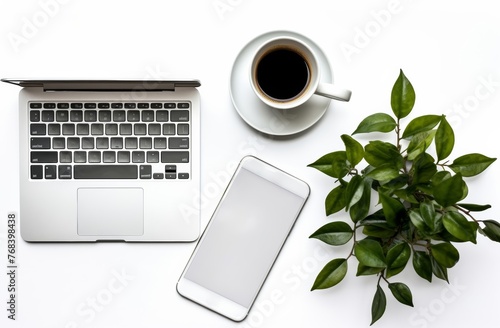 white wood office desk table with laptop computer and mobile phone with cup of coffee and supplies stationary, decrated by green leaves. Generative AI. photo