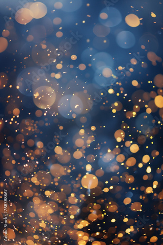 Elegant Festive Bokeh: Dark Blue and Gold Foil Texture with Sparkling Particles, Holiday Background. © sssheina