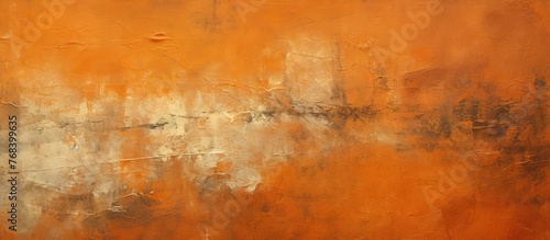 A closeup shot of a painting with shades of brown  amber  orange  and peach  forming a beautiful pattern on a wall resembling a wood flooring rectangle