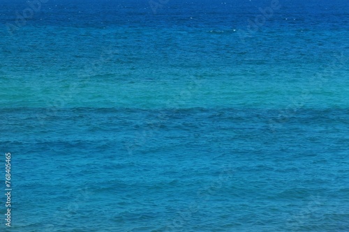 close up of blue sea water surface natural background 