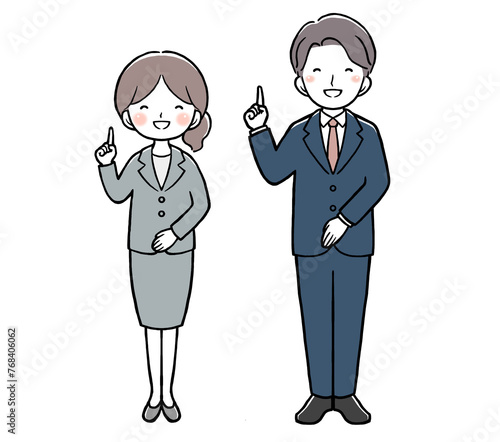 スーツで指差しをする女性と男性
