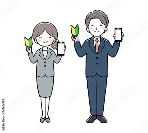 スマホと初心者マークを持つスーツの女性と男性