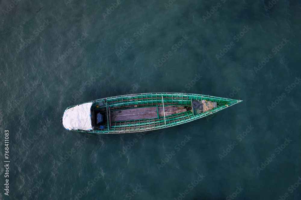 High angle view of a empty solitary fishermen boat at sea High angle view of a empty solitary fishermen boat at sea