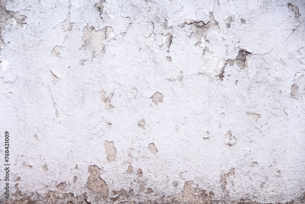 Old white concrete wall with peeling paint texture abstract on background Old white concrete wall with peeling paint texture abstract on background