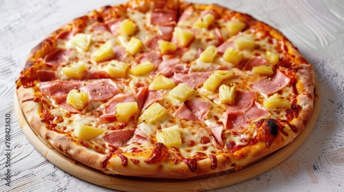 A Hawaiian pizza with ham and pineapple toppings