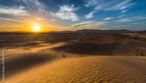                                                          Desert at dusk. Sunset over a vast desert area.