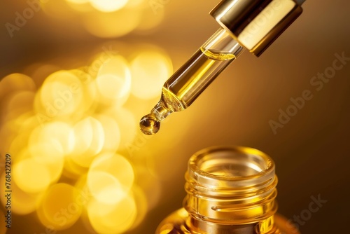 Wallpaper Mural Gold Beauty Serum Pouring from Pipette Torontodigital.ca