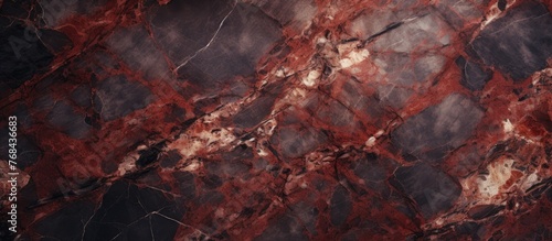 A detailed close-up image of a shiny red marble against a dark black background, showcasing its smooth texture and vibrant color