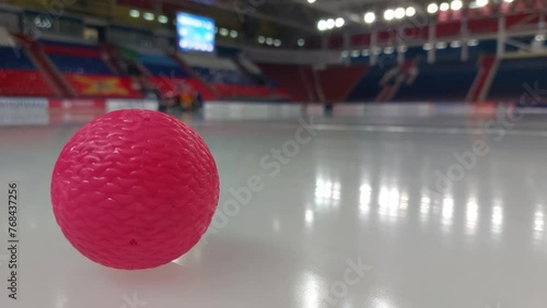 A bandy ball lying on the ice