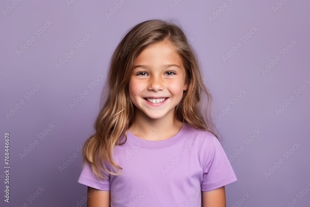 Portrait of a smiling little girl with long hair on purple background Portrait of a smiling little girl with long hair on purple background