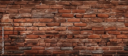 Detailed view showcasing a brick wall with numerous bricks tightly packed together, creating a textured pattern