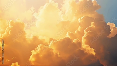 Whimsical clouds backlit by the setting sun resembling a fairytale scene in the sky. photo