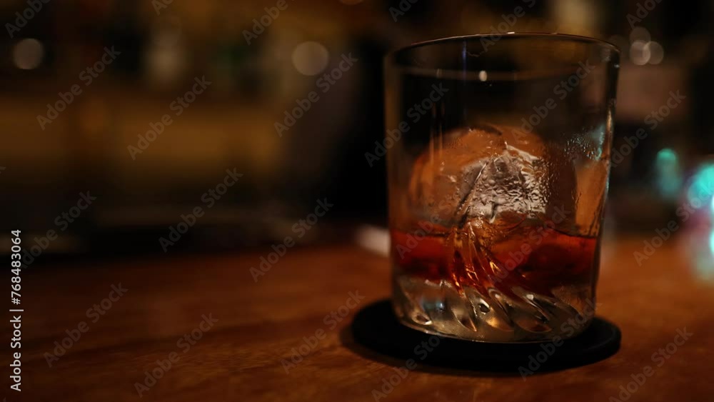 Whiskey Glass on a Bar Counter Whiskey Glass on a Bar Counter