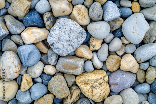 Colorful pebbles on the beach as an abstract background photo