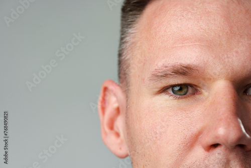 Close up shot of a young man face