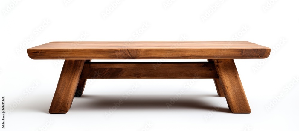 A modern outdoor wooden bench is placed on top of a clean white floor. The benchs sleek design contrasts with the simplicity of the white background. A modern outdoor wooden bench is placed on top of a clean white floor. The benchs sleek design contrasts with the simplicity of the white background.